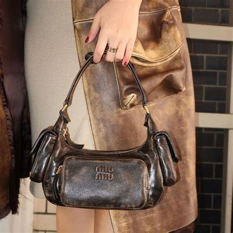 miu miu distressed bag